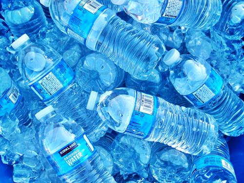 plastic water bottles on ice